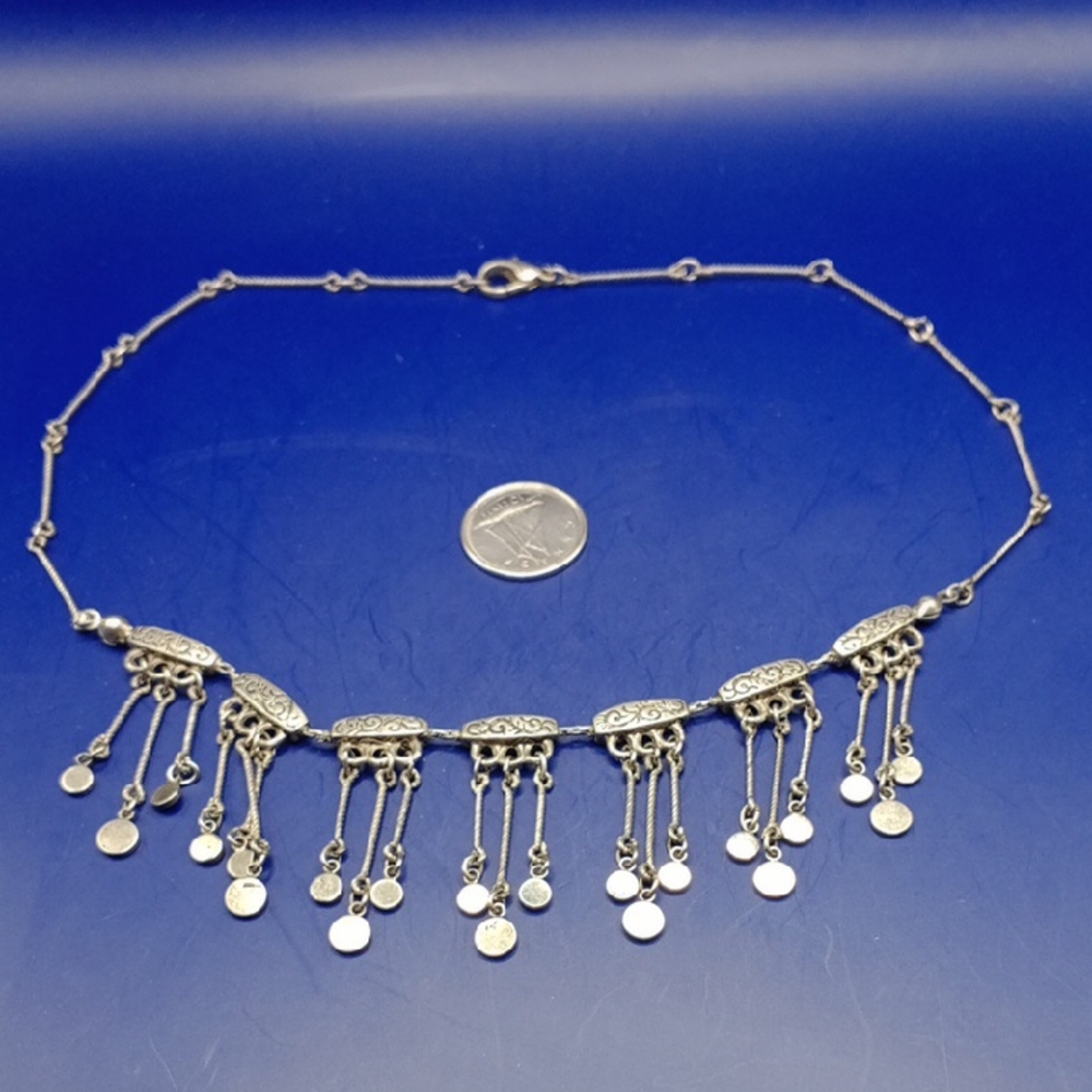 Elegant Silver Necklace with Dangle Charms